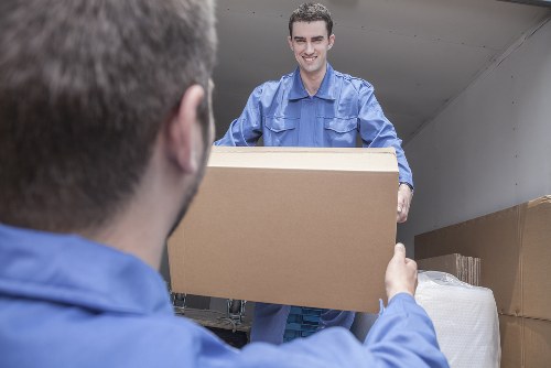 Removal team planning a move in Kensington near period homes and busy local streets