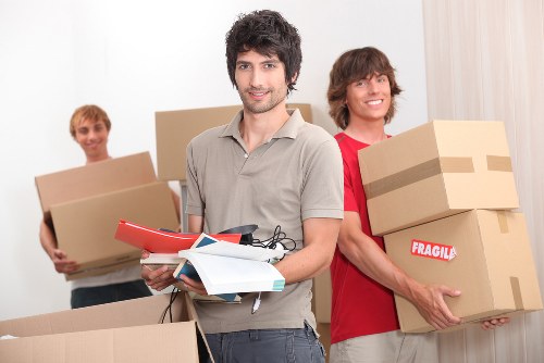 Assorted removal boxes and protective wrapping for packing in Kensington