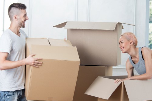 Safety-focused moving crew planning a removal job