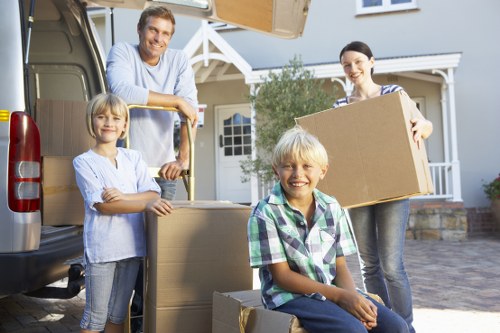 Kensington property loading access with moving truck and boxes