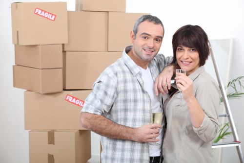 Local moving team handling household items for a Kensington property