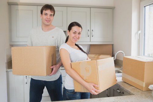 Packed moving boxes ready for collection in a Kensington property